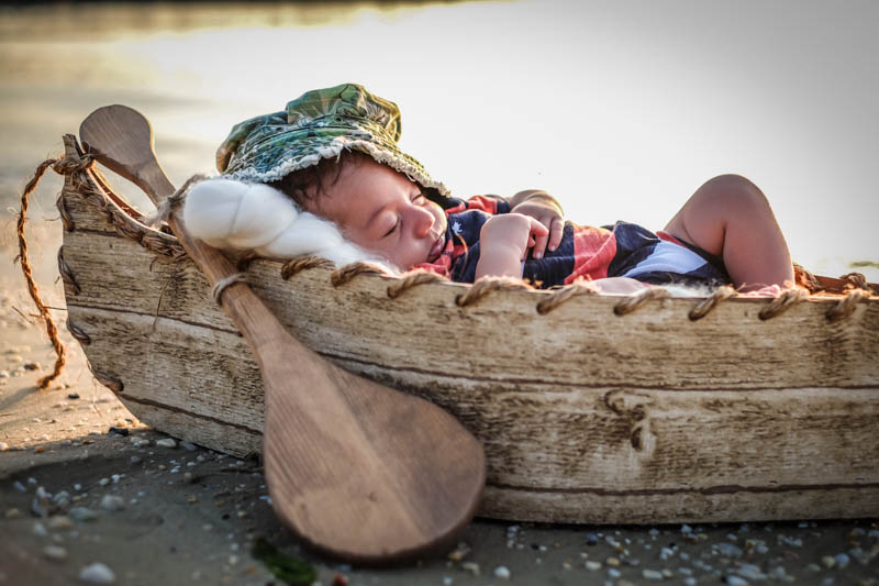Newborn in canoe