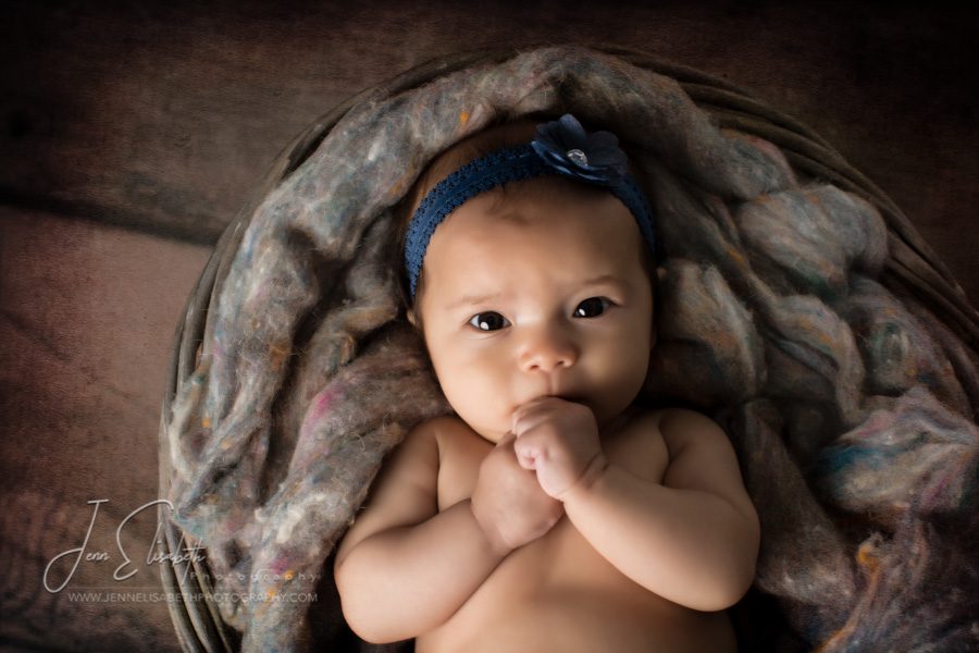 Adorable Baby Girl in Basket