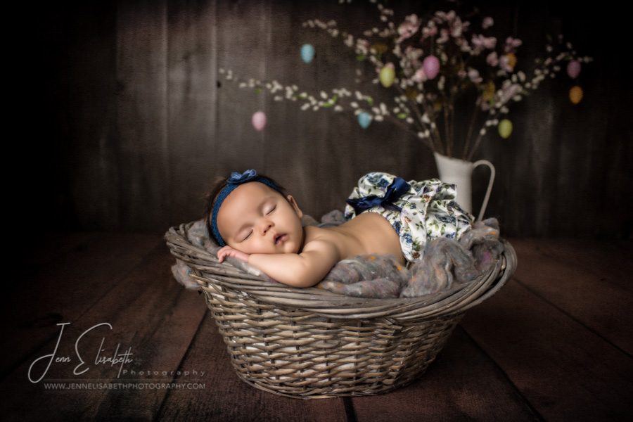 Portrait of baby girl in basket