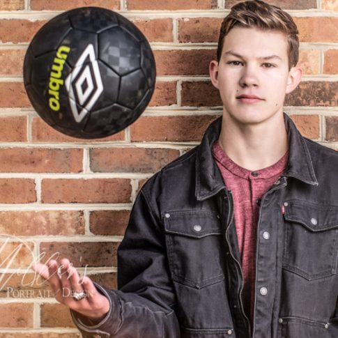 Male Senior Pictures with Soccer Ball at Tackett's Mill