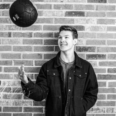 Male Senior Pictures with Soccer Ball at Tackett's Mill